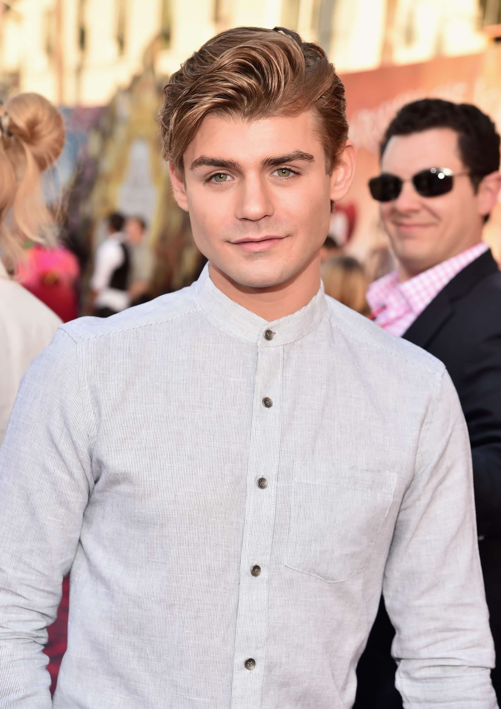 HOLLYWOOD, CA - MAY 23: Actor Garrett Clayton attends Disneys 'Alice Through the Looking Glass' premiere with the cast of the film, which included Johnny Depp, Anne Hathaway, Mia Wasikowska and Sacha Baron Cohen at the El Capitan Theatre on May 23, 2016 in Hollywood, California. (Photo by Alberto E. Rodriguez/Getty Images for Disney) *** Local Caption *** Garrett Clayton
