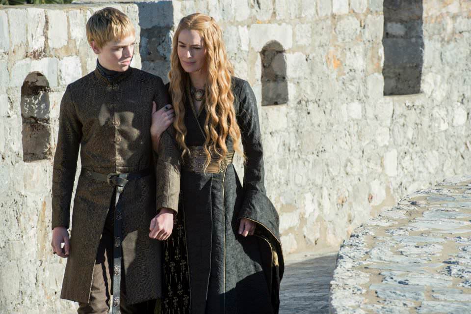 Dean-Charles Chapman as Tommen Baratheon and Lena Headey as Cersei Lannister – photo Macall B. Polay/HBO