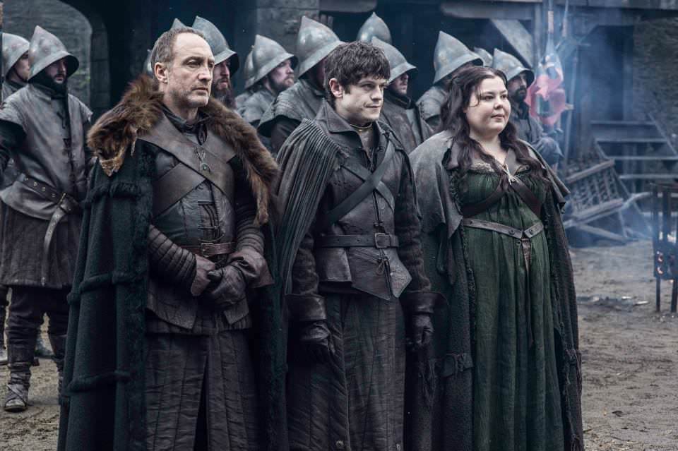 Michael McElhatton as Roose Bolton, Iwan Rheon as Ramsay Bolton and Elizabeth Webster as Walda Frey – photo Helen Sloan/HBO